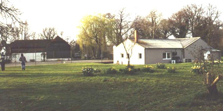 The barn is on the left; in the longish left part of it is Dale's studio; on the right is the studio building.