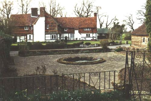Again the private house; at the right edge the barn again; and the fountain (of Salmacis?)